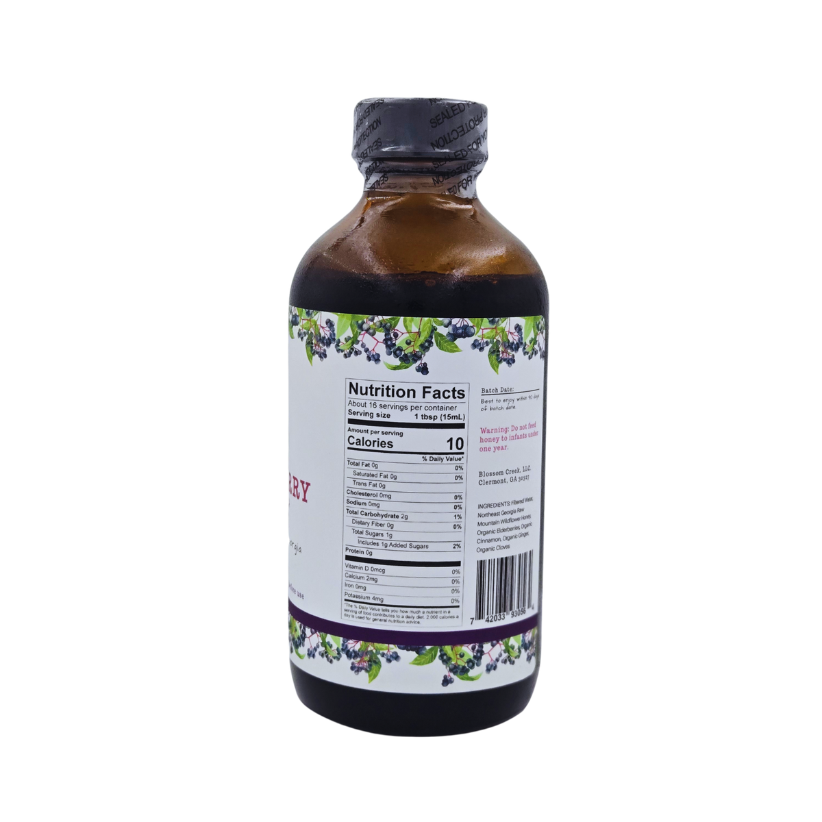 Side view of Blossom Creek 8 oz Elderberry Syrup in an amber glass bottle, featuring a white label with purple and green elderberry illustrations and the Nutrition Facts panel.