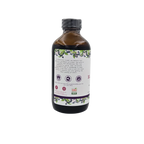 Side view of Blossom Creek 8 oz Elderberry Syrup in an amber glass bottle, featuring the white label with our company story, purple elderberry illustrations, and Georgia Grown logo.